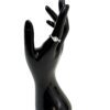 Ring worn on the finger of a black display hand