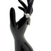 Ring worn on the finger of a black display hand