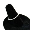 Angled view showing the diamonds set around the band