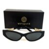 Sunglasses with their black Versace box