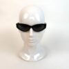 Sunglasses shown front on a white display head
