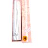 Necklace in its pink gift box with the ribbon