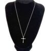 Necklace displayed on a black bust to show the drop