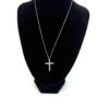 Necklace displayed on a black bust to show the drop