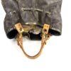 Front view with the drawstring loosened and the top open
