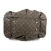 Underside of the bag showing the studs and clean canvas