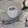 Close up of the pave pendant showing the drum shape