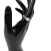 Ring worn on the finger of a black display hand