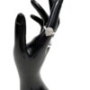 Ring worn on the finger of a black display hand