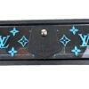 Blue monogram side panel with the leather closure tab