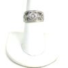 Ring on a white display finger seen from the front