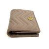 Angled view of the front with the gold GG hardware