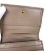 Interior card slots and the press stud closure