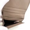 Interior open showing the card slots and zip coin pocket