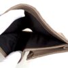 Wallet held open showing the black interior lining