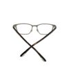Rear view with the temples crossed behind the lenses