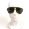 Sunglasses worn on a display head from the front