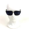 Sunglasses worn on a display head from the front