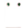 Pair of pear cut emerald earrings on a white display card
