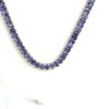 Close view of the oval tanzanite stones along the chain