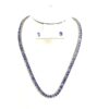 Necklace on a display bust, shown with matching tanzanite stud earrings
