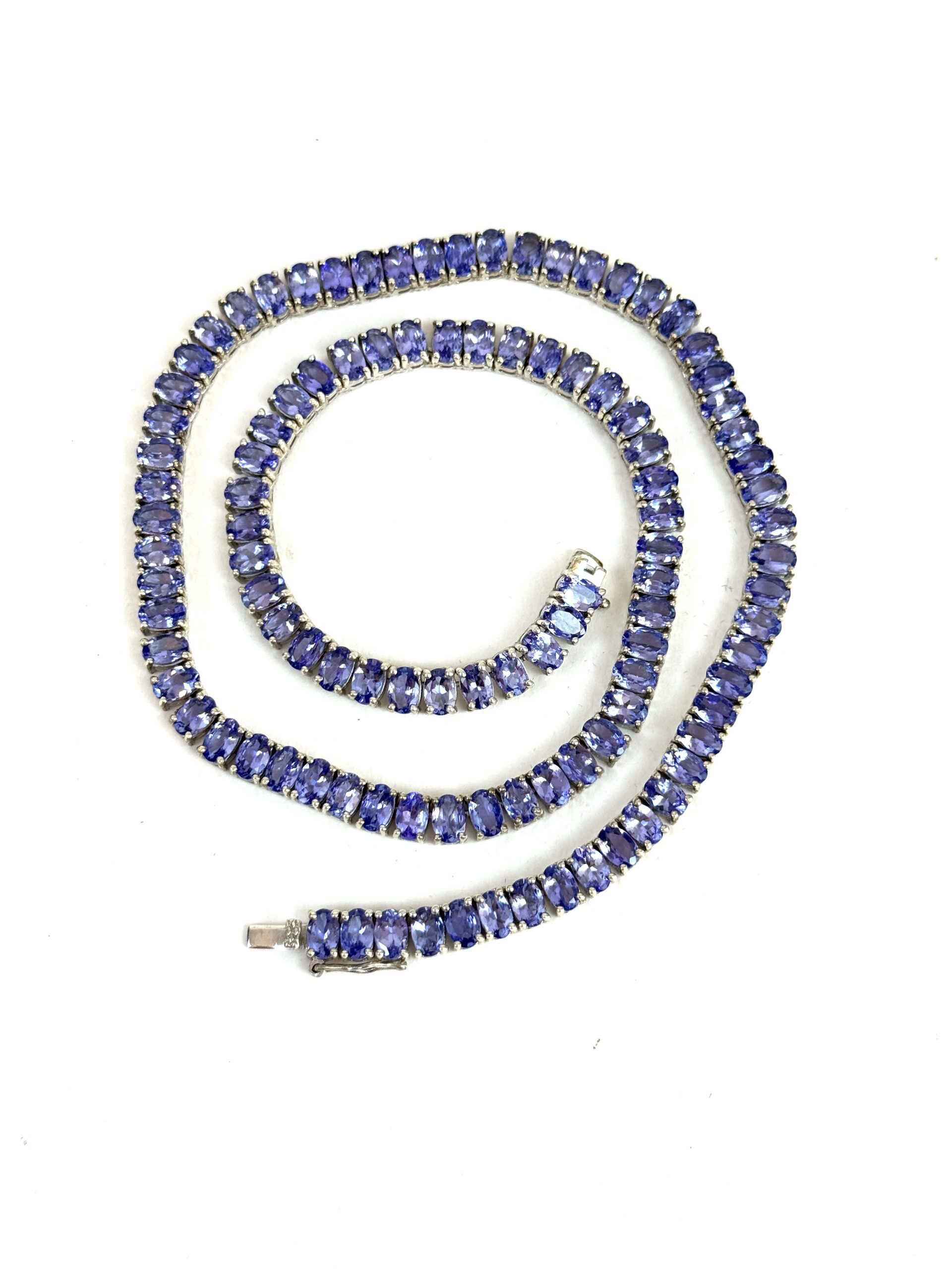 50 Carat Natural Tanzanite 18″ Necklace in .925 Sterling Silver and Matching 2 Carat Earrings Set 50 Carat Natural Tanzanite 18″ Necklace in .925 Sterling Silver and Matching 2 Carat Earrings Set 8