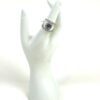 Ring worn on a white display hand