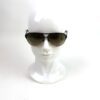 Sunglasses worn on a display head from the front
