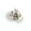 Close up of one round brilliant diamond in its setting