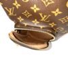 Close up of the drawstring and the monogram canvas flap