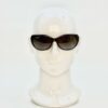 Sunglasses on a display head, seen from the front