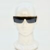 Sunglasses worn on a display head from the front