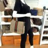 Mannequin carrying the messenger at the hip, front view