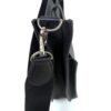 Side view with the strap and leather pull attached