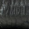 Blind stamp pressed into the black Clemence leather