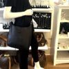 Evelyne PM worn crossbody by a mannequin in the boutique
