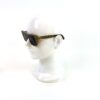 Angled view of the sunglasses on the display head