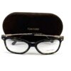 Frames resting in front of the brown Tom Ford case
