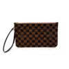 Front of the pochette with the wristlet strap hanging