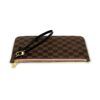Angled view with the strap laid across the canvas