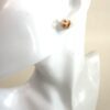 Earring shown on a display ear to give a sense of scale