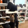 Mannequin holding the Egg Bag by its top handle