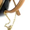 Zip pull and chain fitting in gold hardware