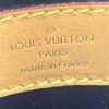 Leather tag reading LOUIS VUITTON PARIS made in France