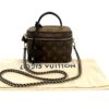 Vanity shown with its Louis Vuitton dust bag and chain strap
