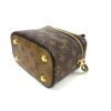 Base at an angle showing the gold protective studs