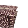 Base corner showing the embroidered canvas