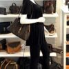 Montaigne carried in the hand by a mannequin in the boutique