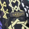 Care label reading 100 percent silk, dry clean only