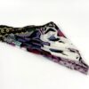 Scarf loosely folded showing several print panels